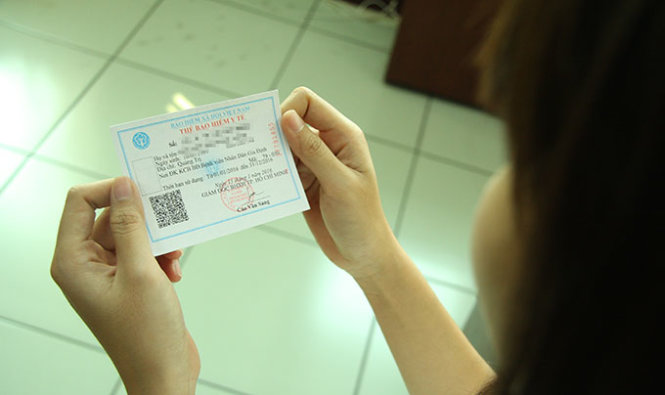Đã mua thẻ BHYT hộ gia đình có phải đóng tiếp tại nơi làm